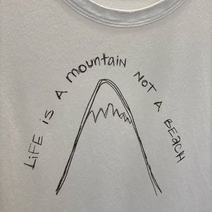 Style mint white tee. “Life is a mountain, not a beach”. Size 3 or small.